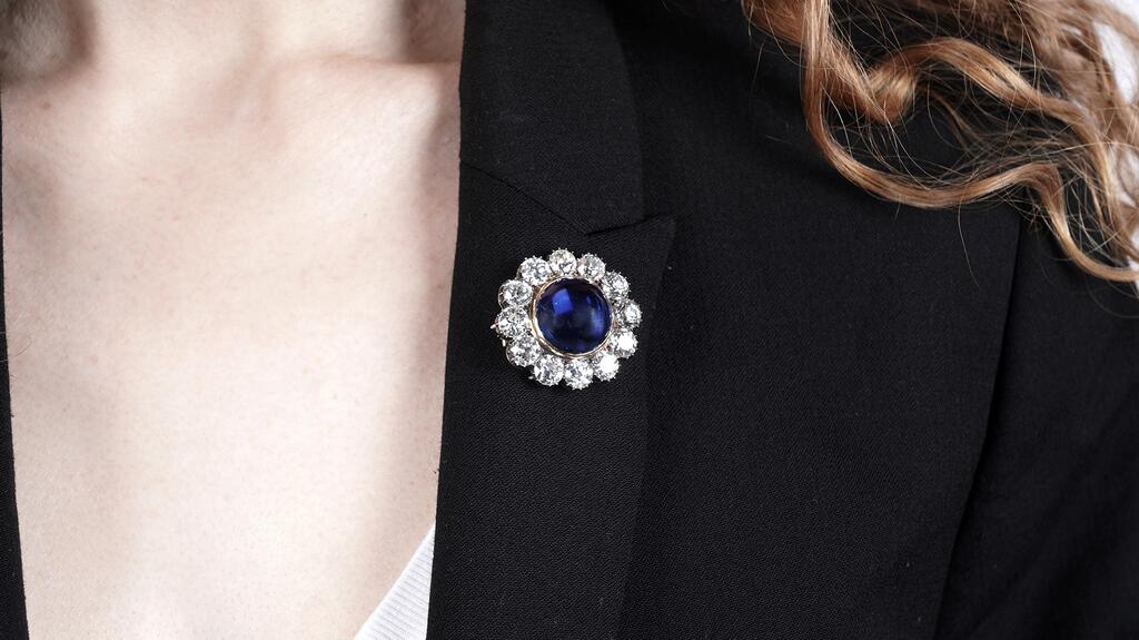 The sapphire and diamond brooch, seen here pinned to a lapel Victorian Burmese sapphire and diamond brooch