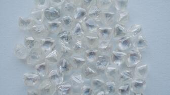 Stock image of rough diamonds  
