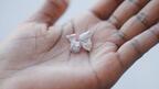 De Beers rough diamonds in someone’s hand 