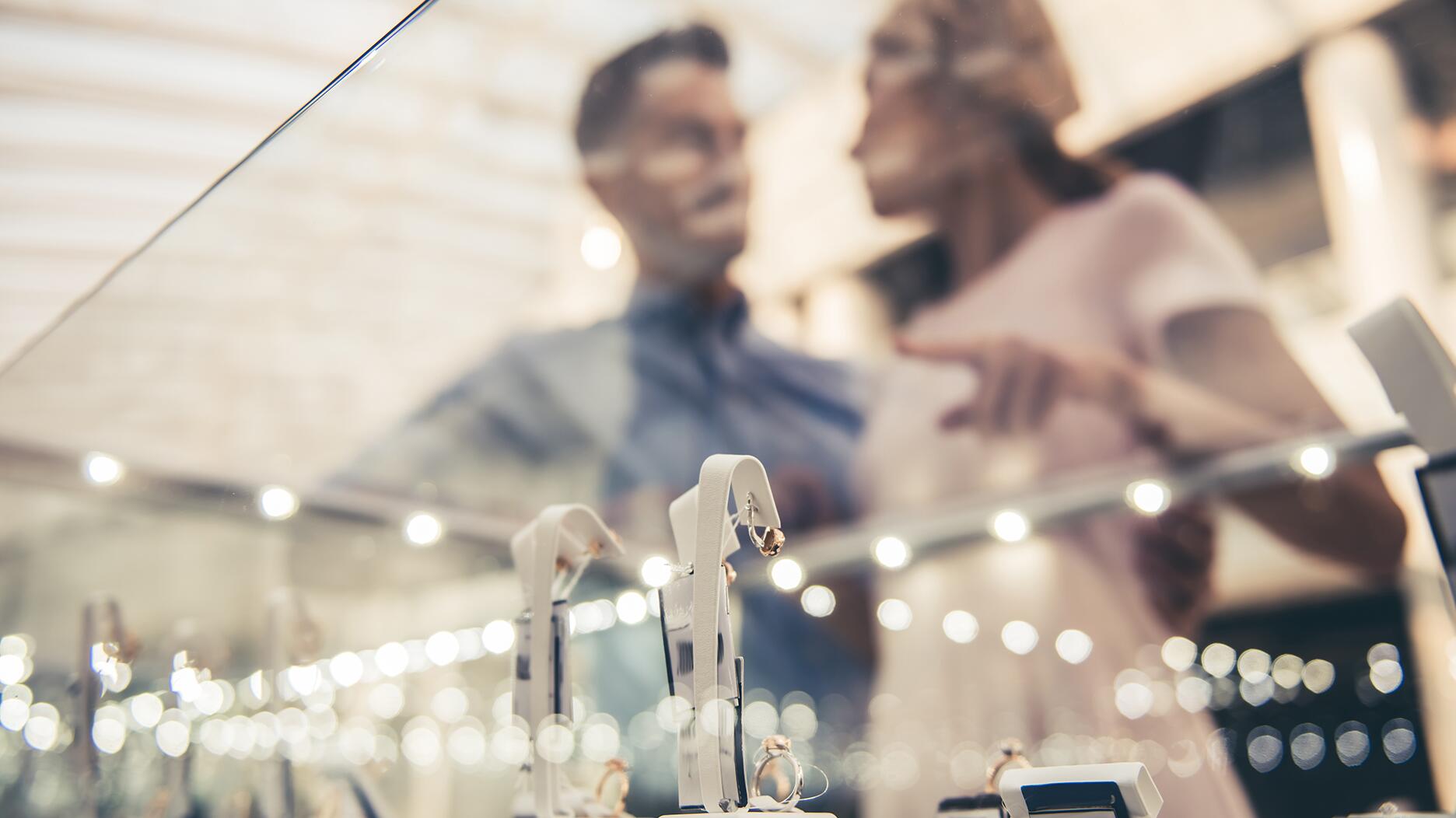 Stock image of couple shopping for jewelry  