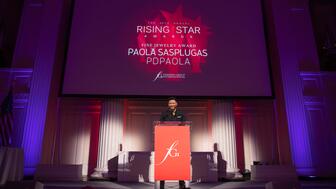 Jason McNary accepting FGI Fine Jewelry Rising Star award for Paola Sasplugas